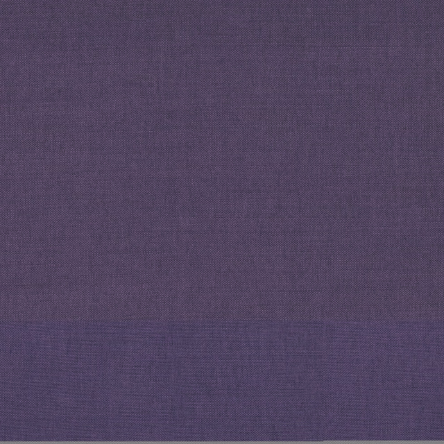 Close-up of muted prune-purple plain weave with fine crosshatched texture