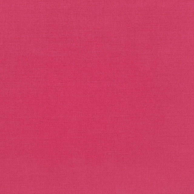 Saturated rhubarb-pink fabric showing a fine, even woven texture
