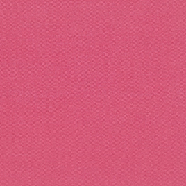 Close-up of muted rose-pink Linara fabric showing a fine, even woven texture
