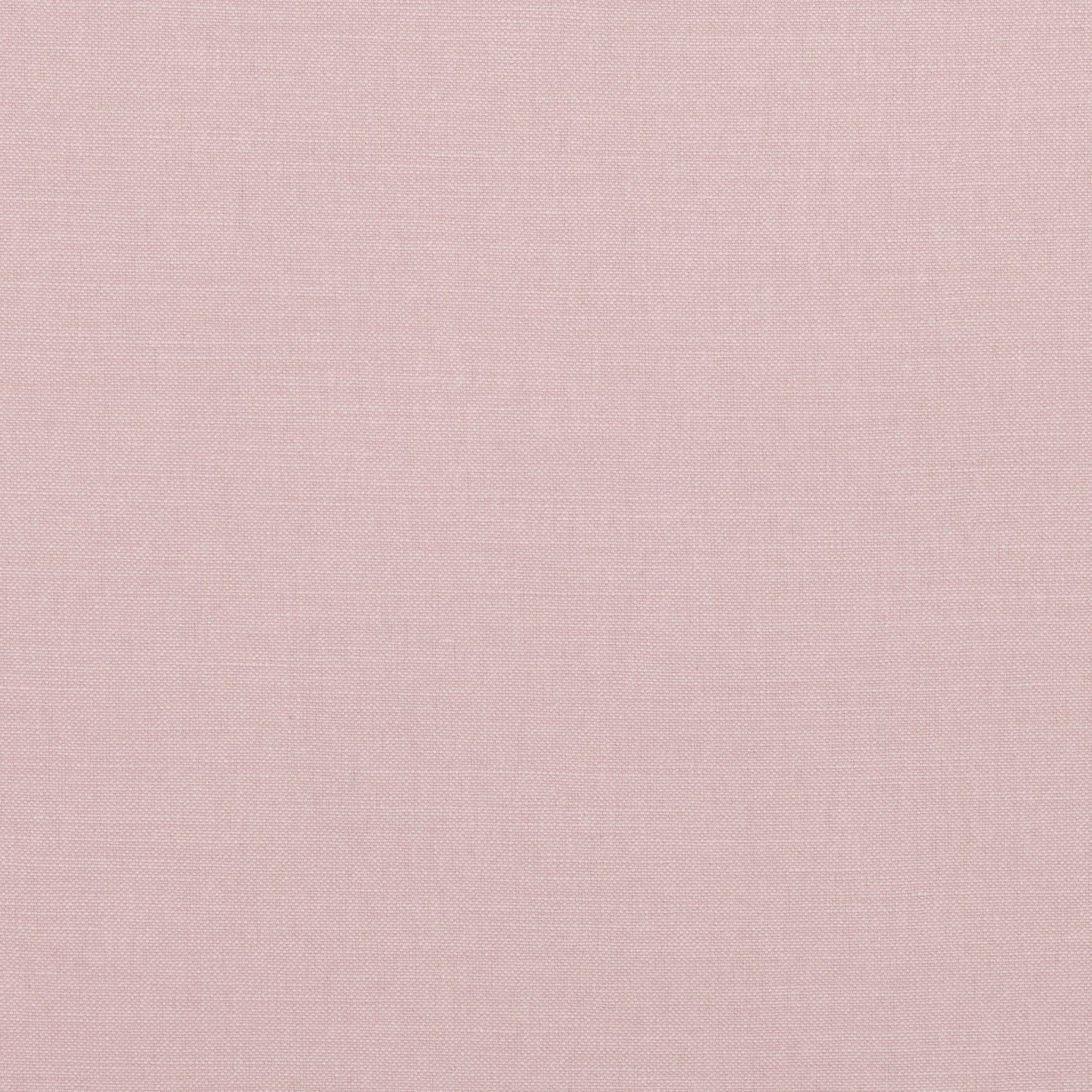 Close-up of muted dusty rose fabric with a fine, softly textured plain weave