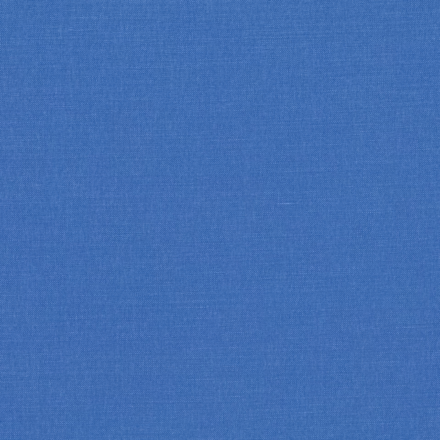 Muted mid blue fabric with a fine, subtly mottled plain weave