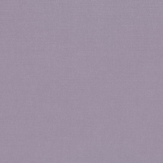Close view of muted wisteria-lilac fabric with a fine, even woven texture