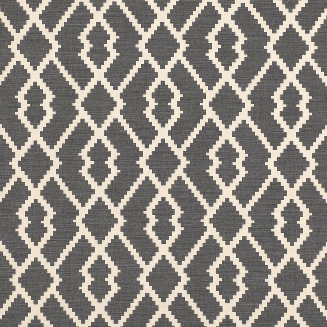 Charcoal-grey and ivory woven geometric lattice with stepped diamond motifs