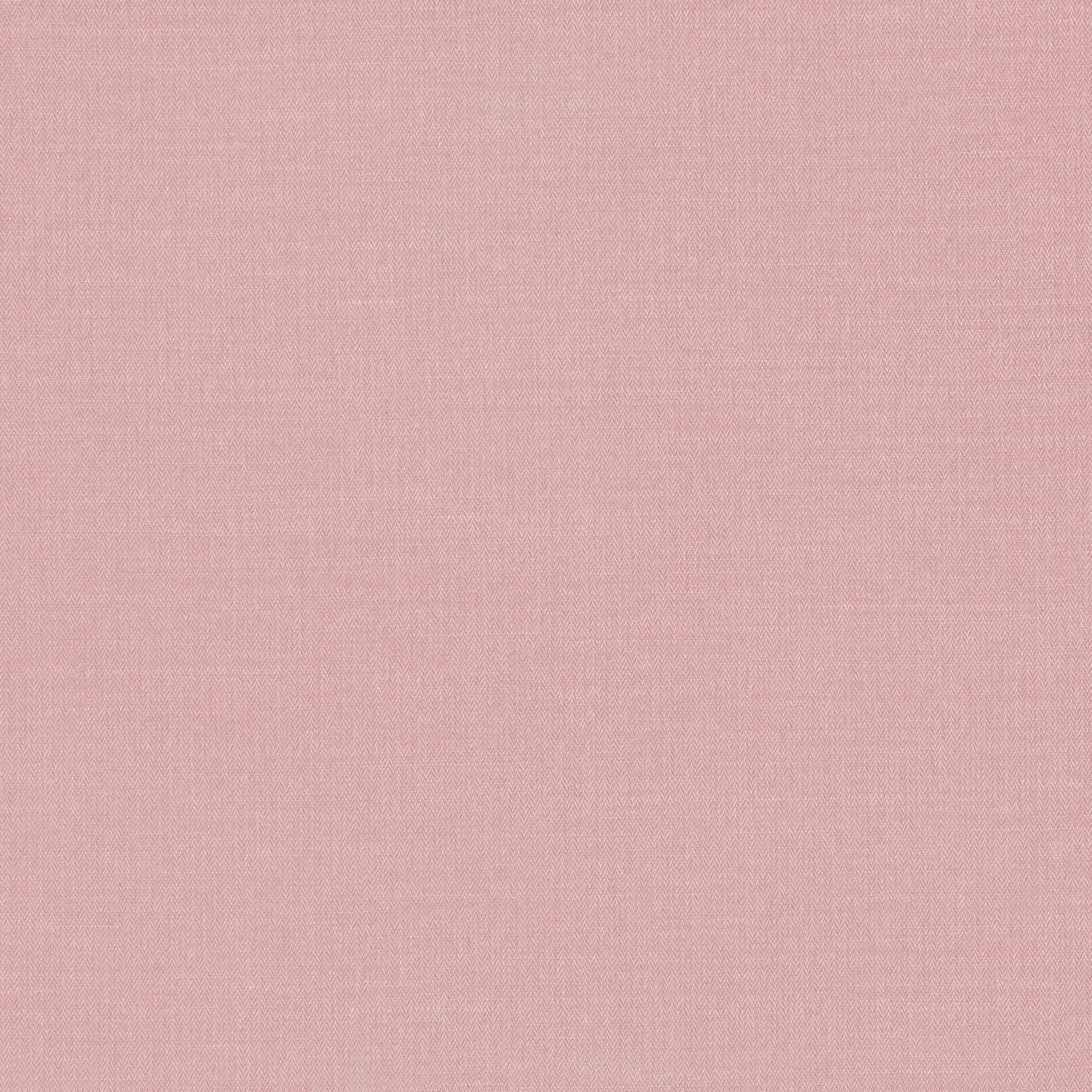 Close-up of dusty blush pink fabric with a fine, softly matte woven texture