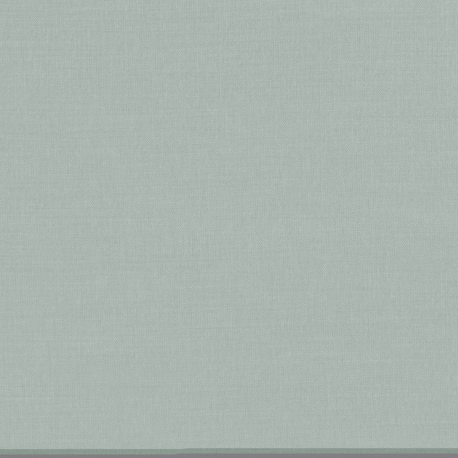 Close view of muted French blue-grey fabric with a fine woven surface