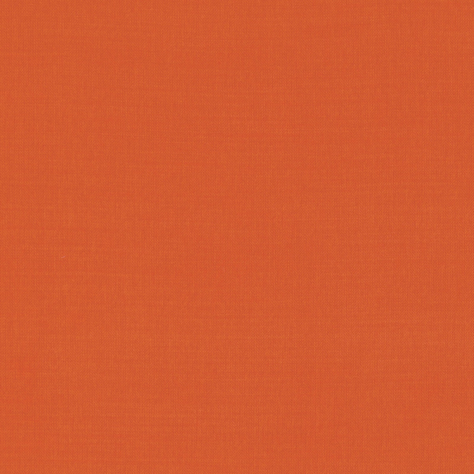 Close-up of warm henna-orange plain weave with a fine, even texture