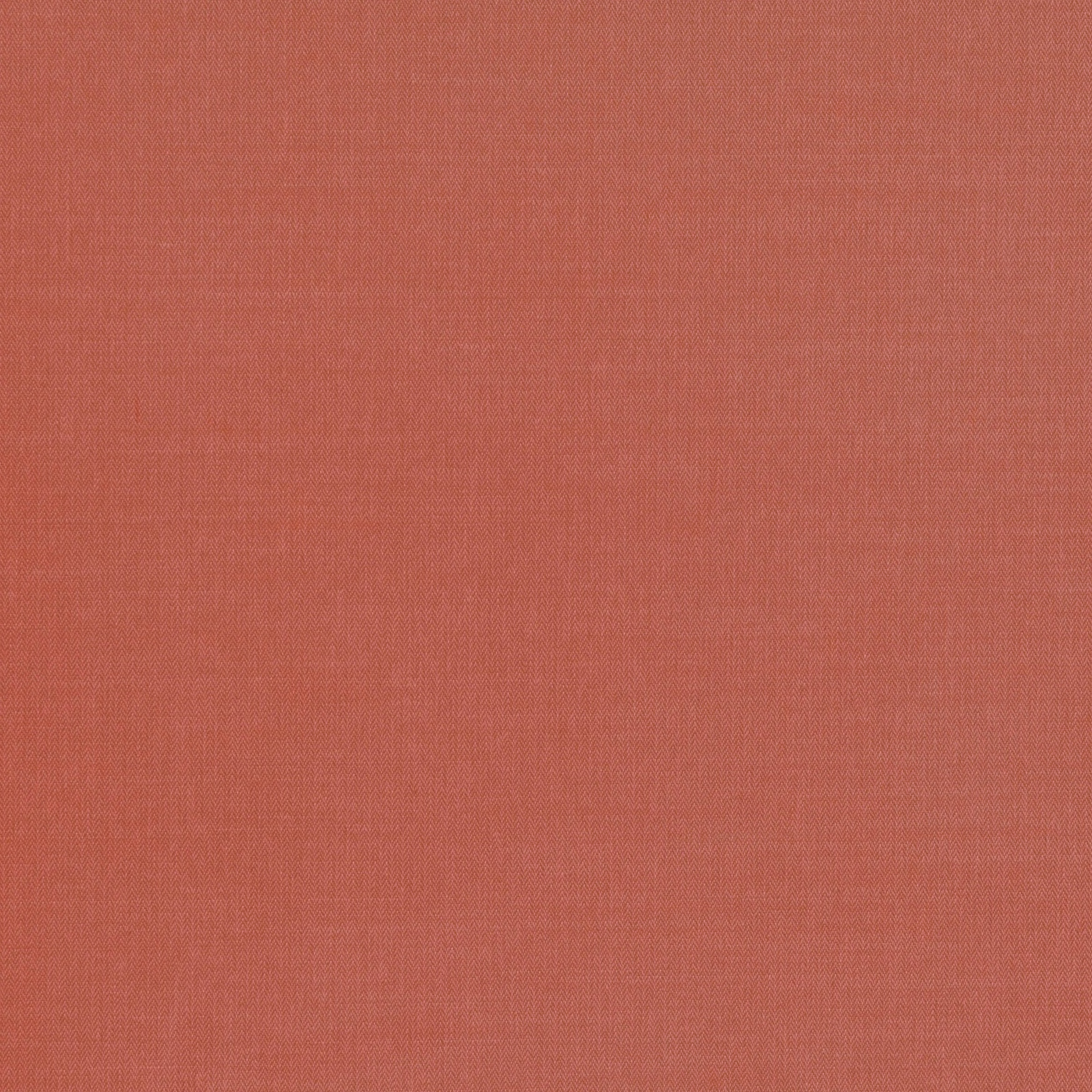 Close-up of muted terracotta plain weave with a fine, even surface texture