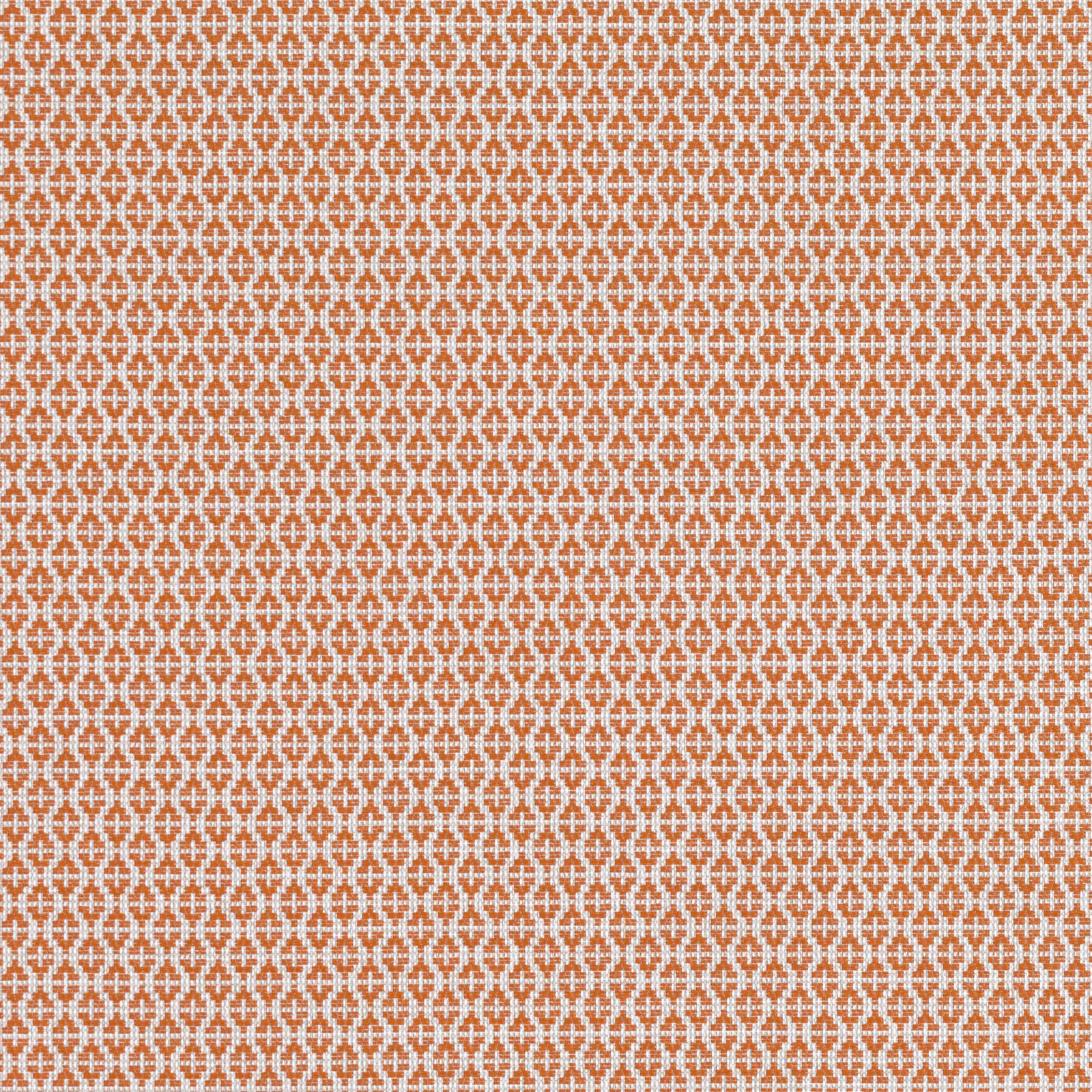 Terracotta textile swatch with dense cream interlocking geometric motifs and woven texture