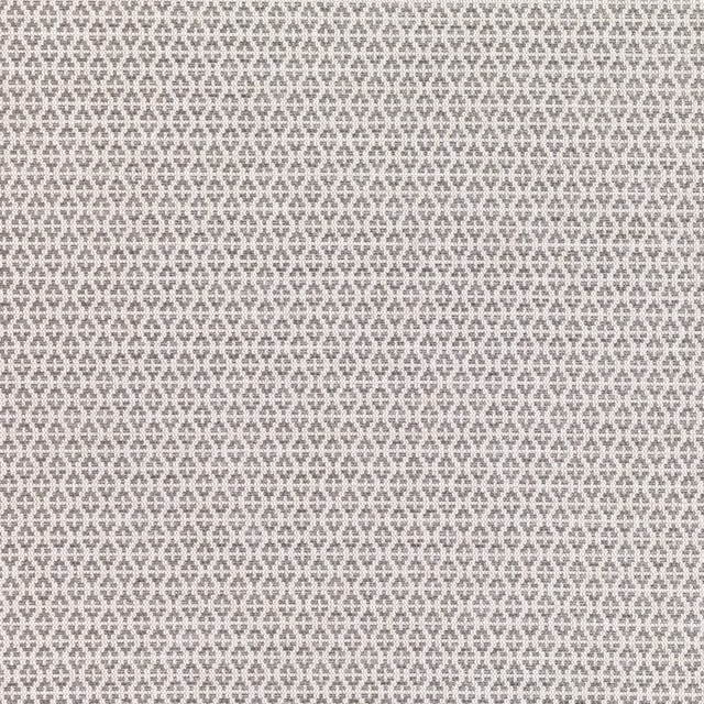 Warm sand-taupe fabric with a small grey geometric trellis and woven texture