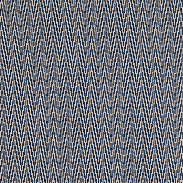 Close-up of cool indigo upholstery fabric with pale grey geometric zigzag weave