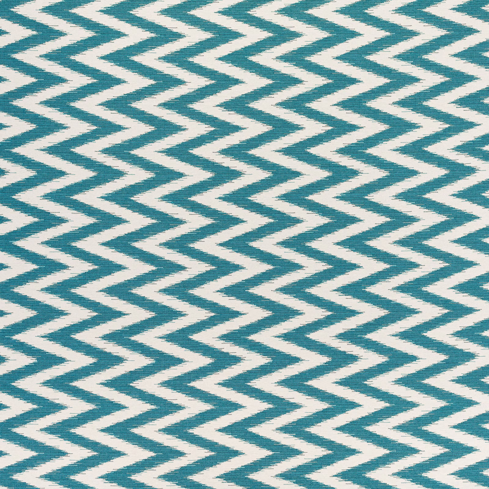 Teal-blue zigzag chevrons across an ivory woven textile with visible texture
