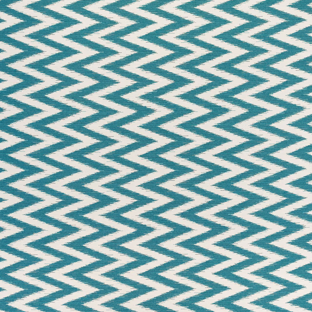 Teal-blue zigzag chevrons across an ivory woven textile with visible texture