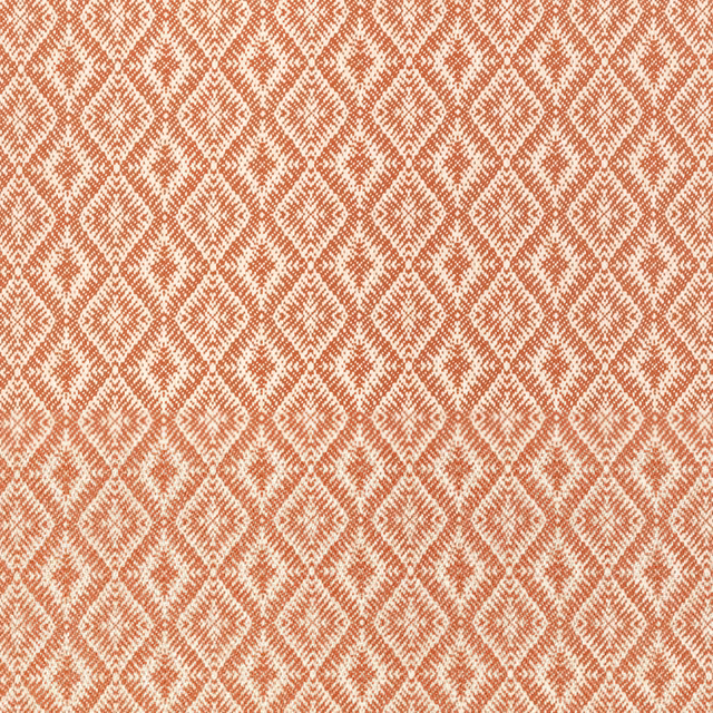 Warm henna and ivory woven diamond pattern with softly textured surface
