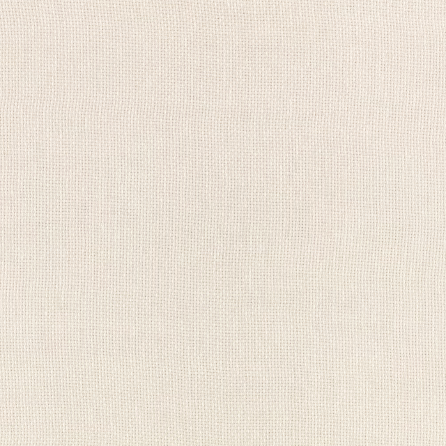 Warm sandstone-beige textile showing a fine, even woven crosshatch under soft light
