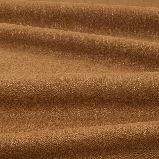 Warm cinnamon-brown textile with fine pebbled weave and softly shaded folds