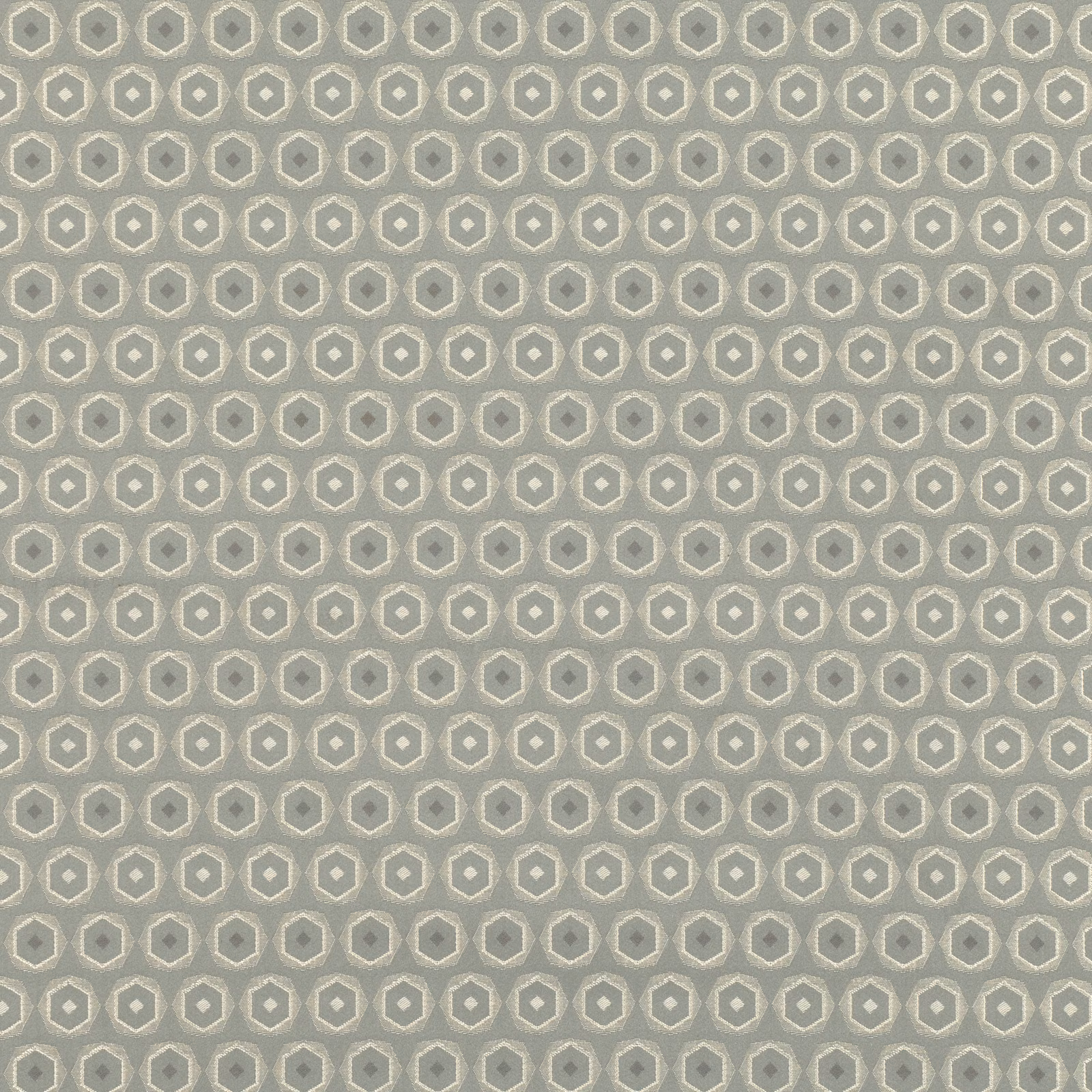 Eucalyptus green fabric with small cream-edged octagonal motifs and woven texture