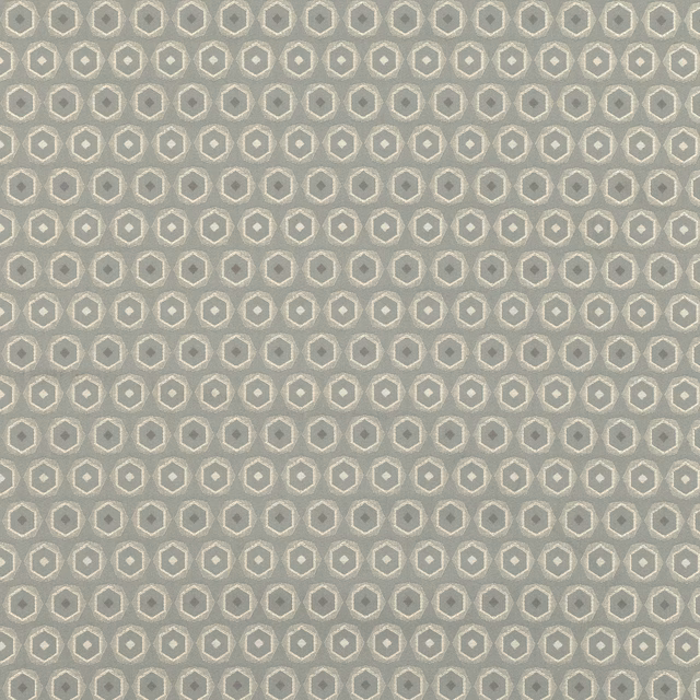 Eucalyptus green fabric with small cream-edged octagonal motifs and woven texture