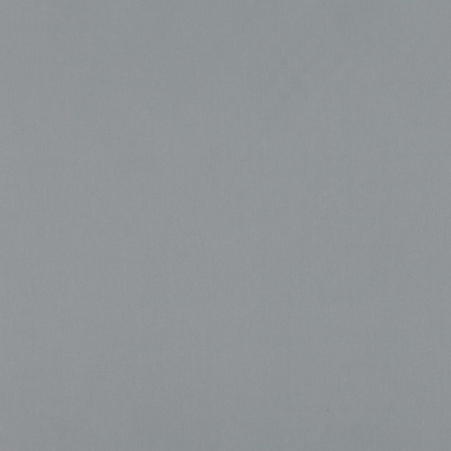Close-up of cool blue-grey Oriel Gris fabric with a subtle even woven texture