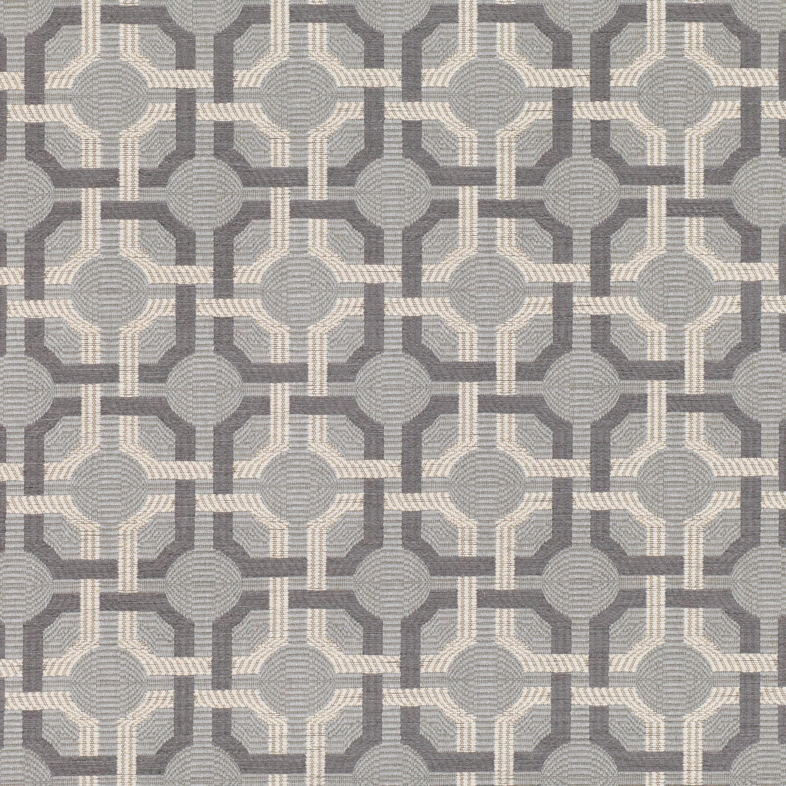 Cool grey and ivory woven geometric fabric with concentric circular motifs