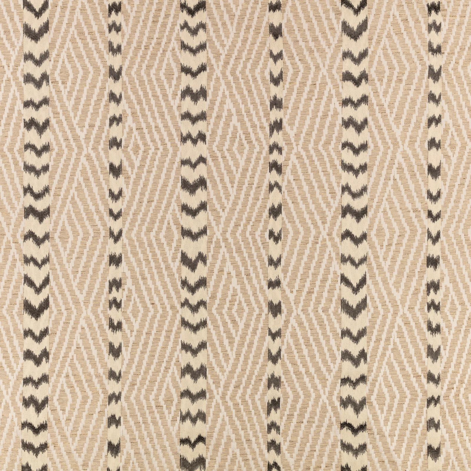 Warm beige woven ground with charcoal zigzag stripes in a vertical geometric pattern