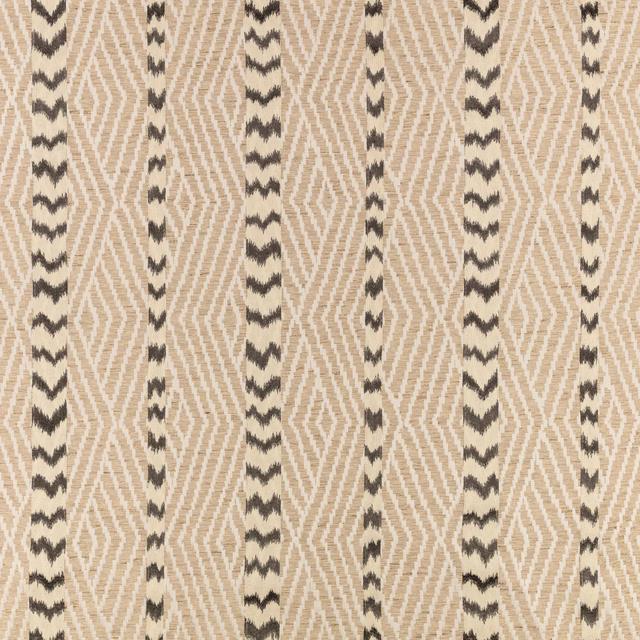 Warm beige woven ground with charcoal zigzag stripes in a vertical geometric pattern