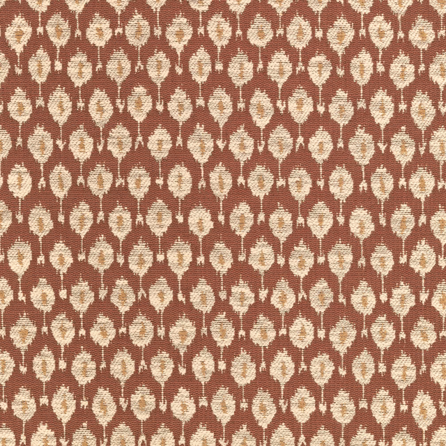 Terracotta-brown woven fabric with repeating cream leaf-like motifs in rows