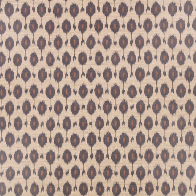 Beige wallpaper with repeating charcoal ikat motifs and rust-coloured centres