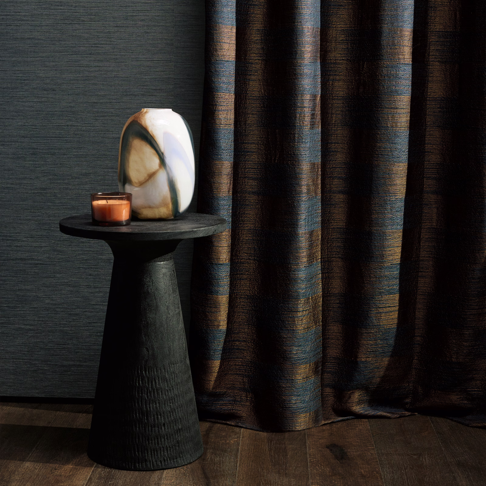 Charcoal curtain with muted blue-grey and brown vertical woven bands