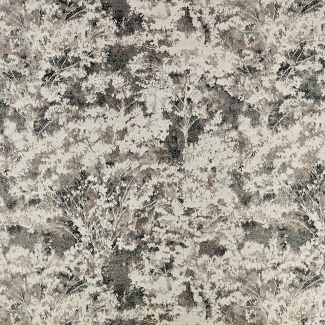 Charcoal botanical fabric with cream foliage and softly mottled textured surface