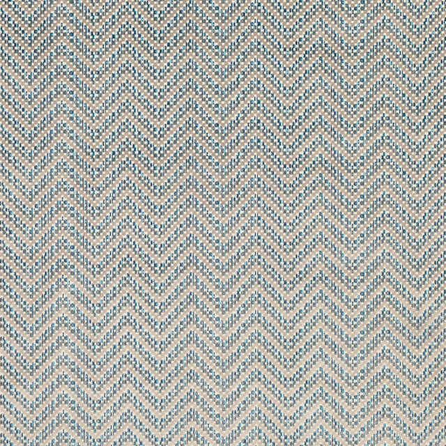 Muted Moroccan blue and sandy beige woven chevron fabric with tactile geometric texture