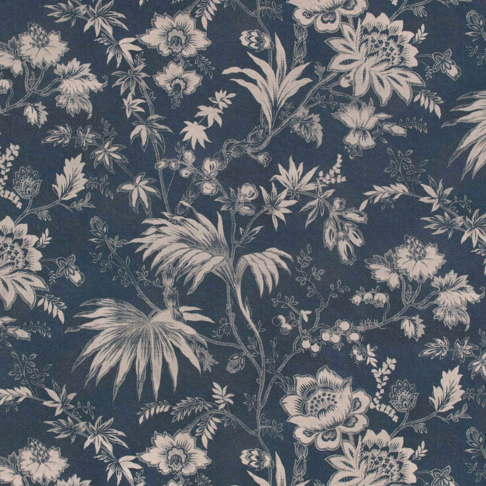 Deep indigo floral fabric with pale botanical stems, blossoms and feathery leaves