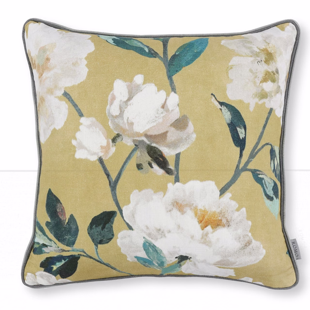 Mustard-gold floral fabric with ivory blooms and blue-green leafy stems