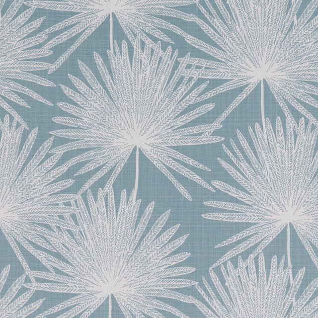 Muted smoke-blue woven fabric with oversized white radiating leaf motifs