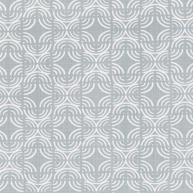 Cool blue-grey woven fabric with ivory interlocking curved geometric motifs