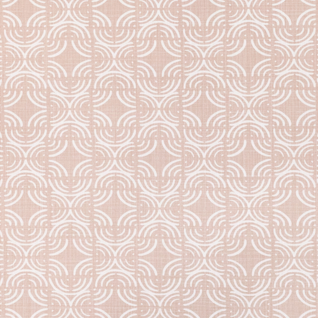 Dusty rose pink fabric with repeating white curved motifs and fine texture
