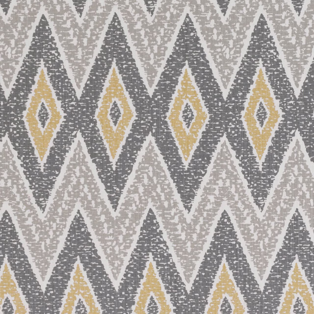 Charcoal, cream and ochre diamond motifs with a broken, tactile-looking surface