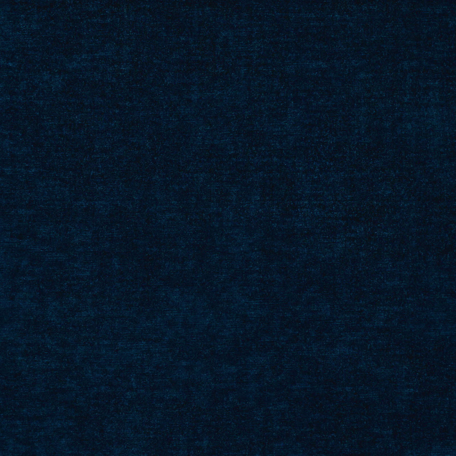 Deep sapphire blue fabric with subtle mottled texture and near-black tonal depth