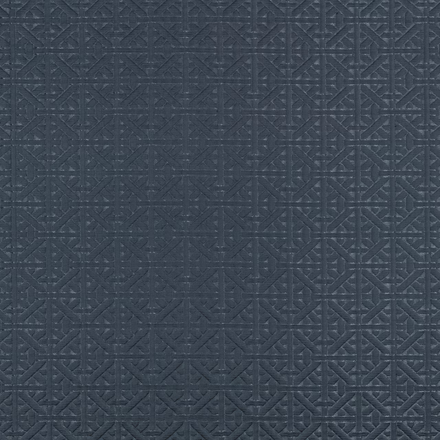 Midnight blue textile with a raised interlocking geometric lattice and charcoal-toned texture