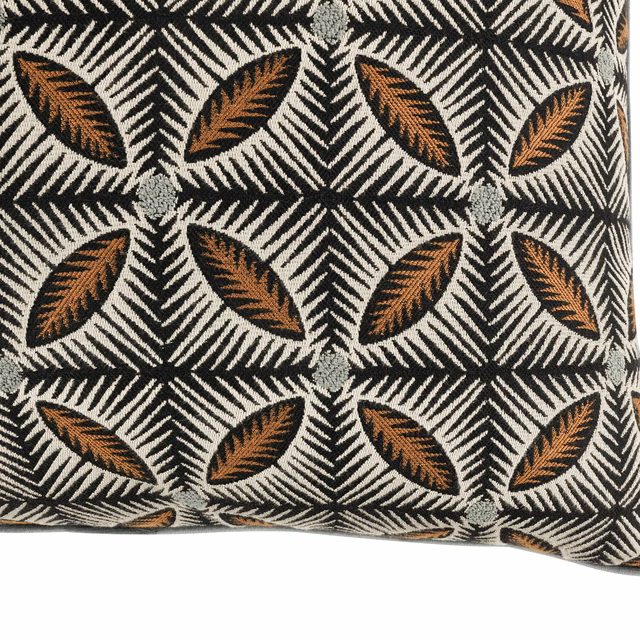 Charcoal woven fabric with rust leaf motifs, cream herringbone and pale grey rosettes
