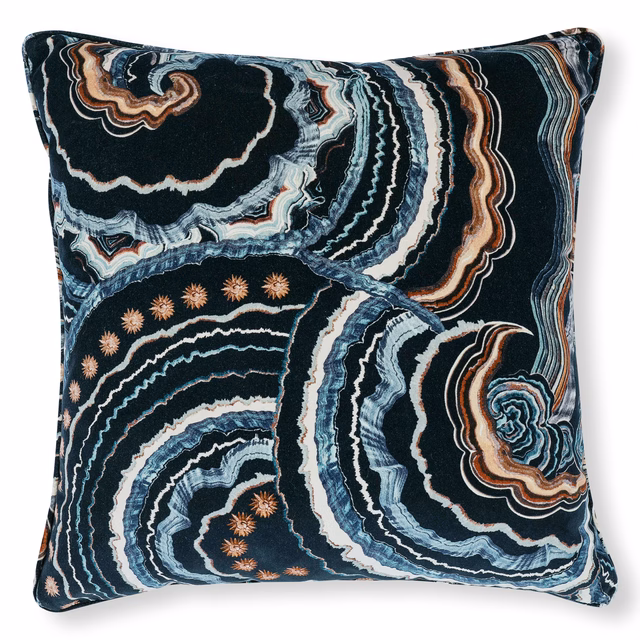 Near-black agate swirls with icy blue, ivory, copper and starburst accents