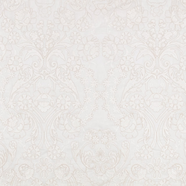 Pale jasmine textile with symmetrical taupe floral damask and delicate scrolling detail