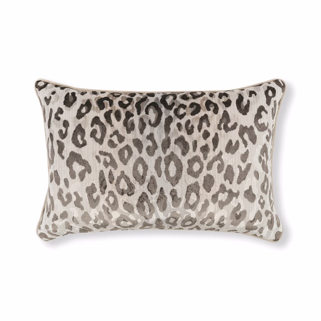 Gris velvet cushion with grey taupe animal spots on a creamy ground