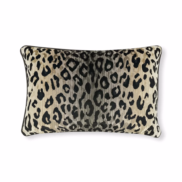 Stone-beige velvet cushion with charcoal leopard spots and subtle vertical nap