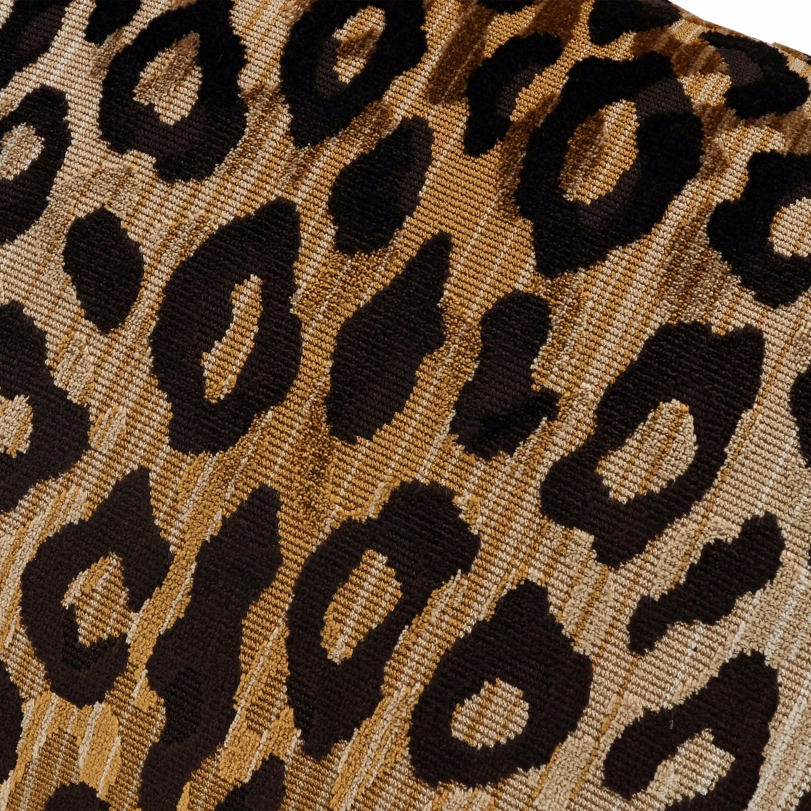 Warm tan velvet with bold black leopard rosettes and textured pile