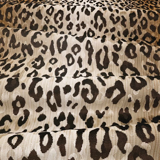 Warm tan velvet with irregular dark brown and black leopard spots