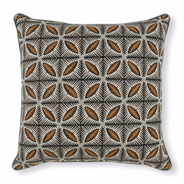 Charcoal and cream lattice cushion with repeating ochre leaf motifs