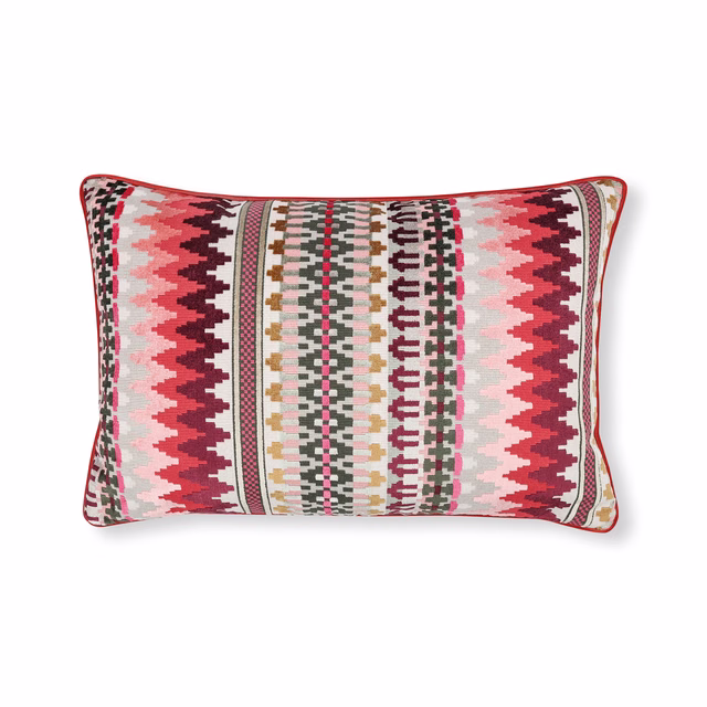 Hot pink geometric cushion with vertical zigzag bands in cream, charcoal and blush