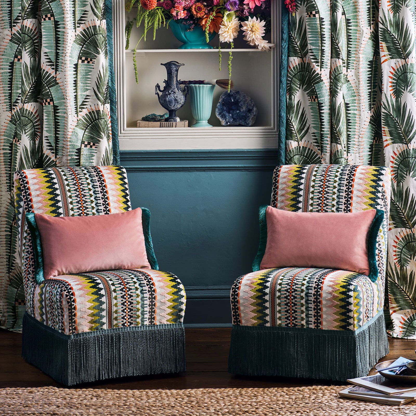 Teal, coral, ivory and black geometric zigzag upholstery on two chairs