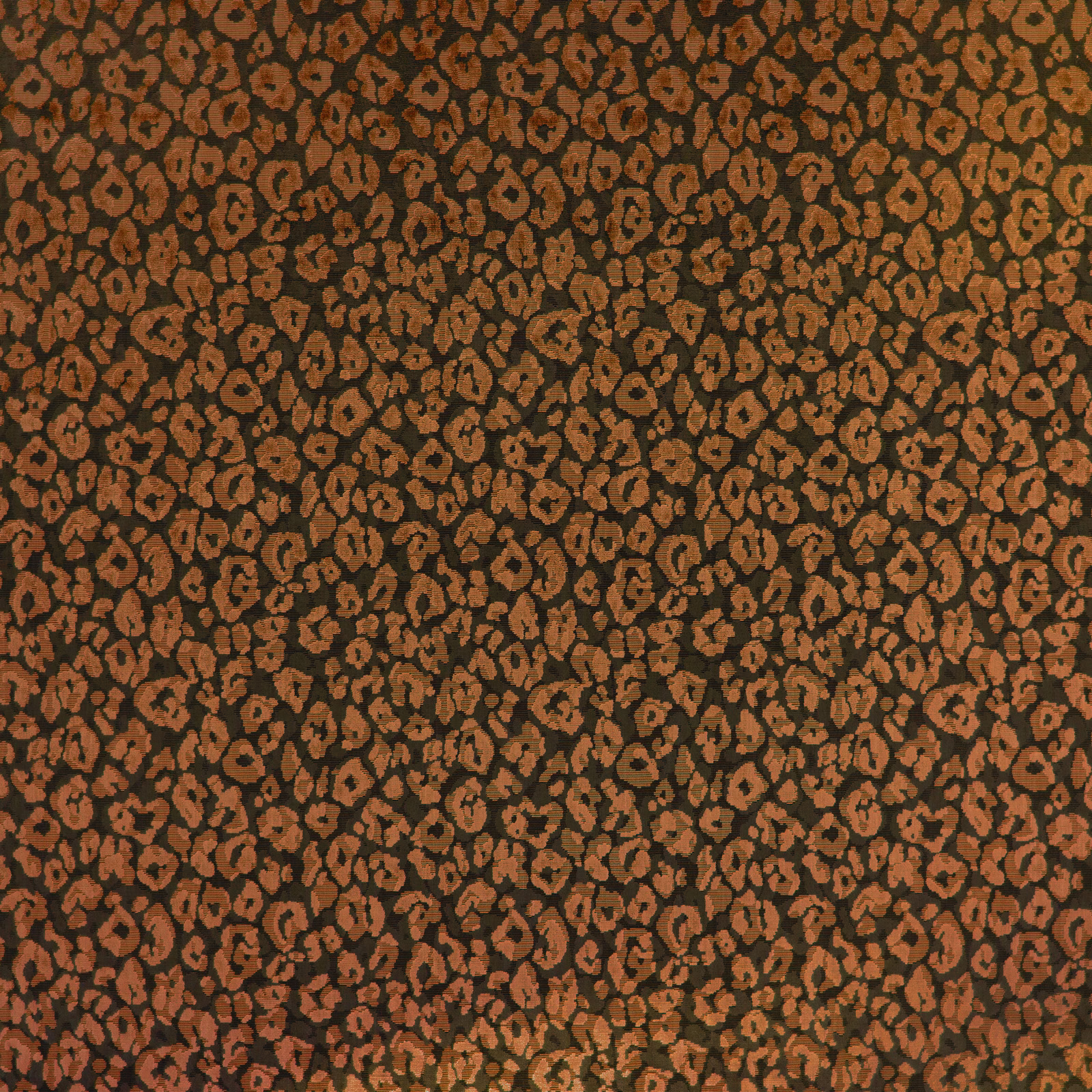 Dense sienna animal spots across a dark brown textured fabric surface