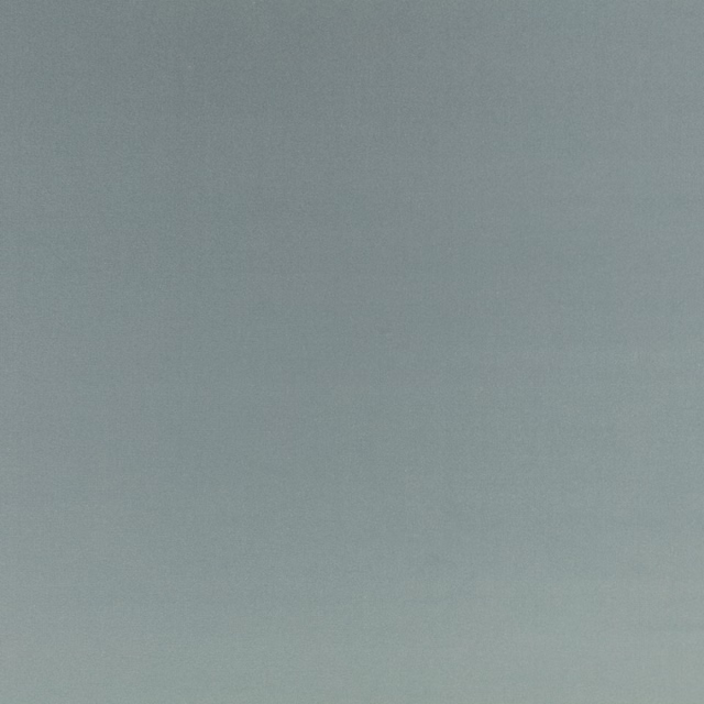 Muted blue-grey velvet with a softly shifting nap and plain surface